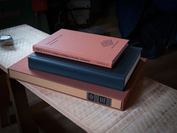 The three Roubo volumes we have produced so far – for scale. On the top, the standard "To Make as Perfectly as Possible: Roubo on Marquetry." In the middle is "The Book of Plates." And on the bottom is the deluxe edition of "Roubo on Marquetry."