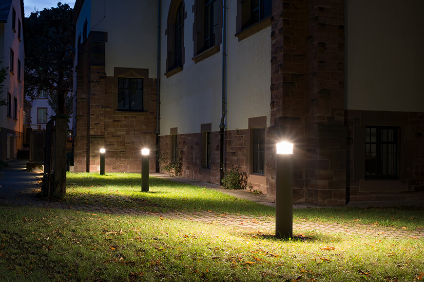 Lighting bollards outside building