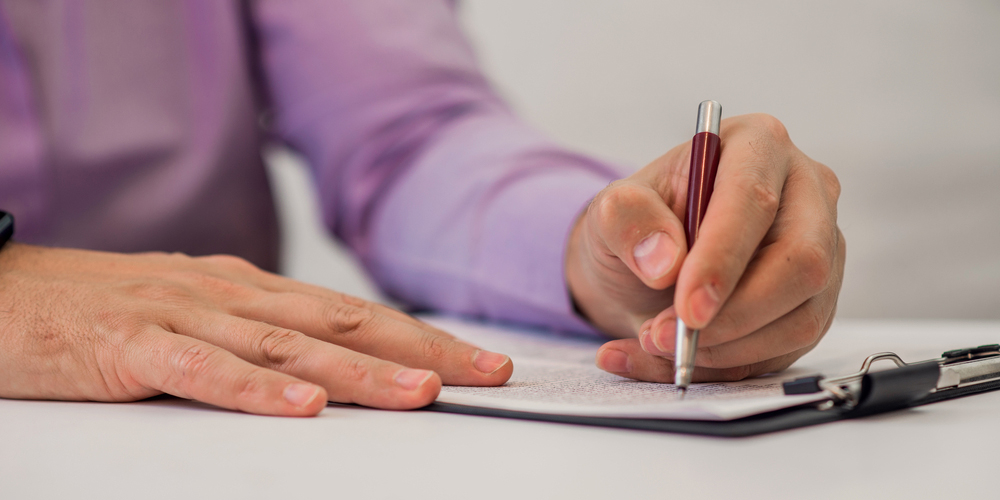 Man Keeping Written Record