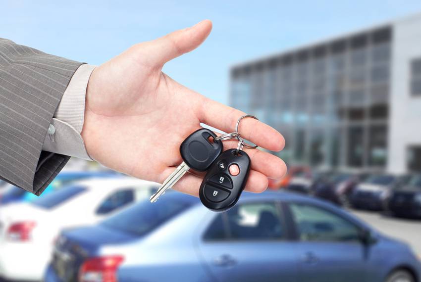 car key in front of the car