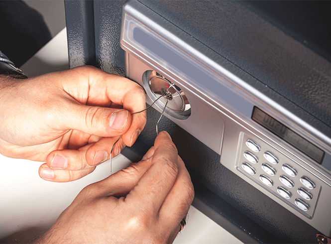 Locksmith picking safe lock